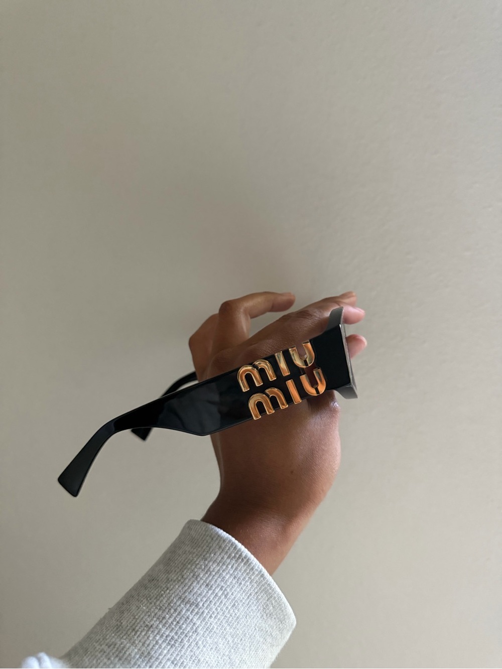 Miu Miu Black Sunglasses with Gold Logo Accent - Picture 4 of 10